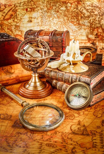 vintage-still-life-vintage-magnifying-glass-lies-pocket-watch-old-book-armillary-sphere-ancient-world-map-1565_564276-9726